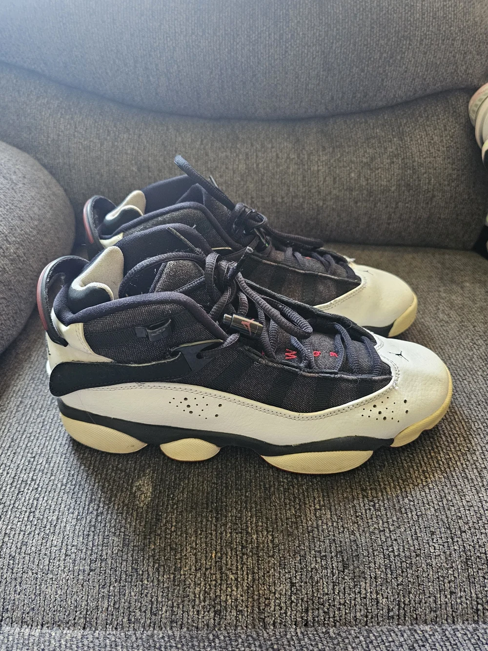 Jordan Men's Black and White Retro Sneakers with Cream Soles